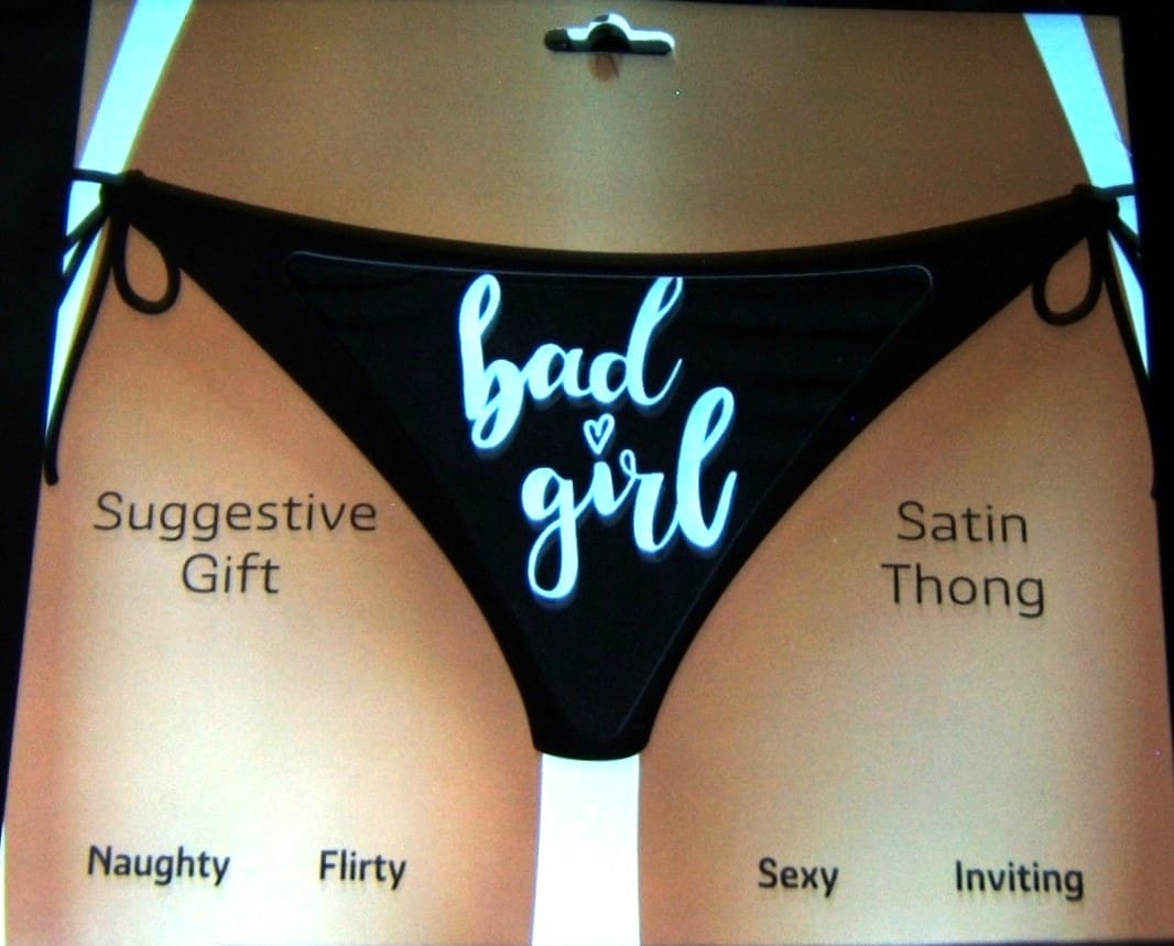 A black and white picture of a thong with the words " bad girl ".