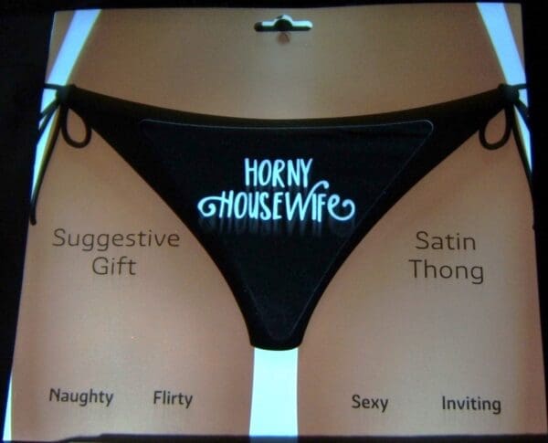 A picture of the underwear that is labeled " horny housewife ".