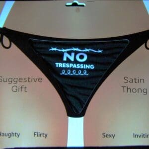 A black and white bikini with the words " no trespassing ".