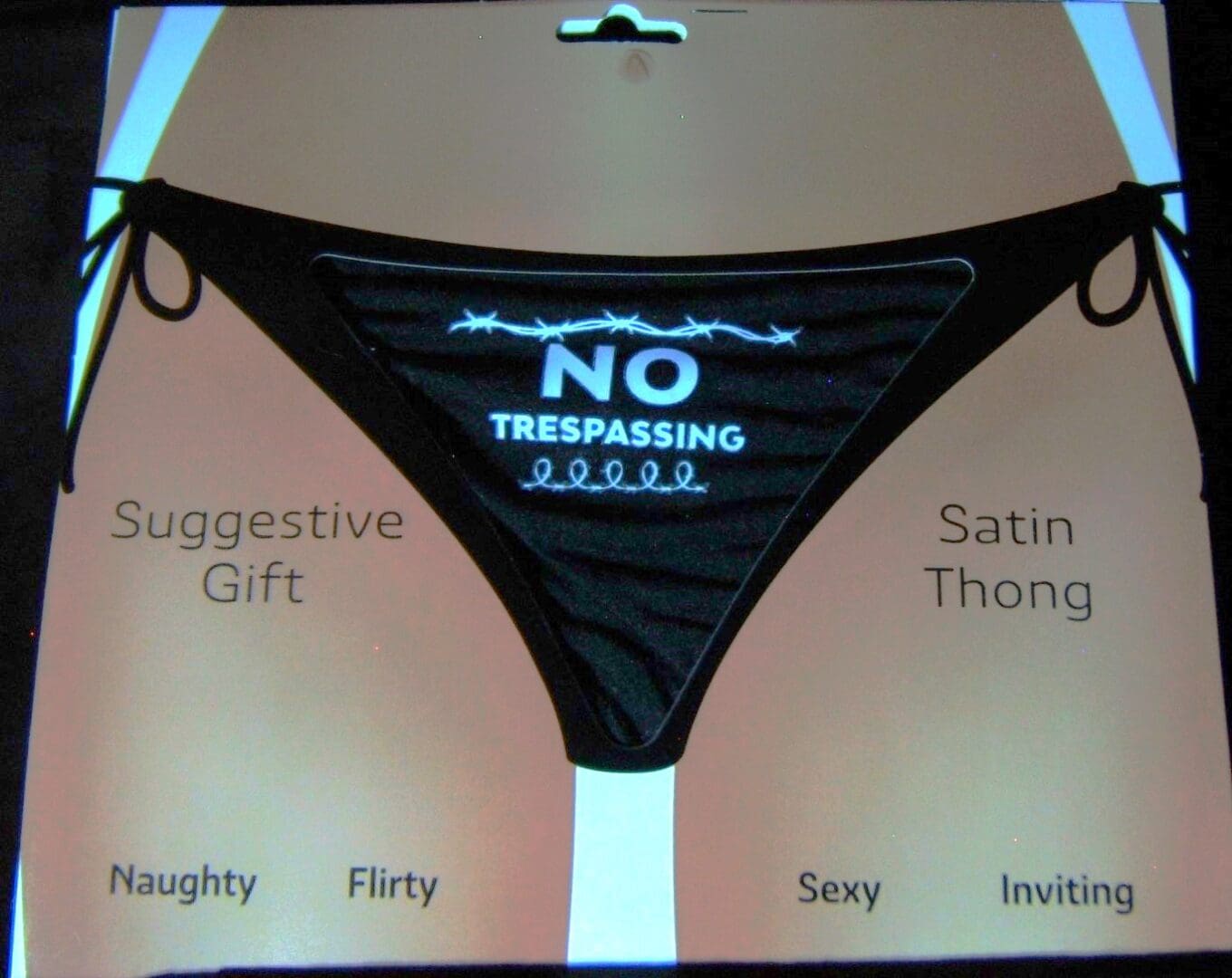 A black and white bikini with the words " no trespassing ".