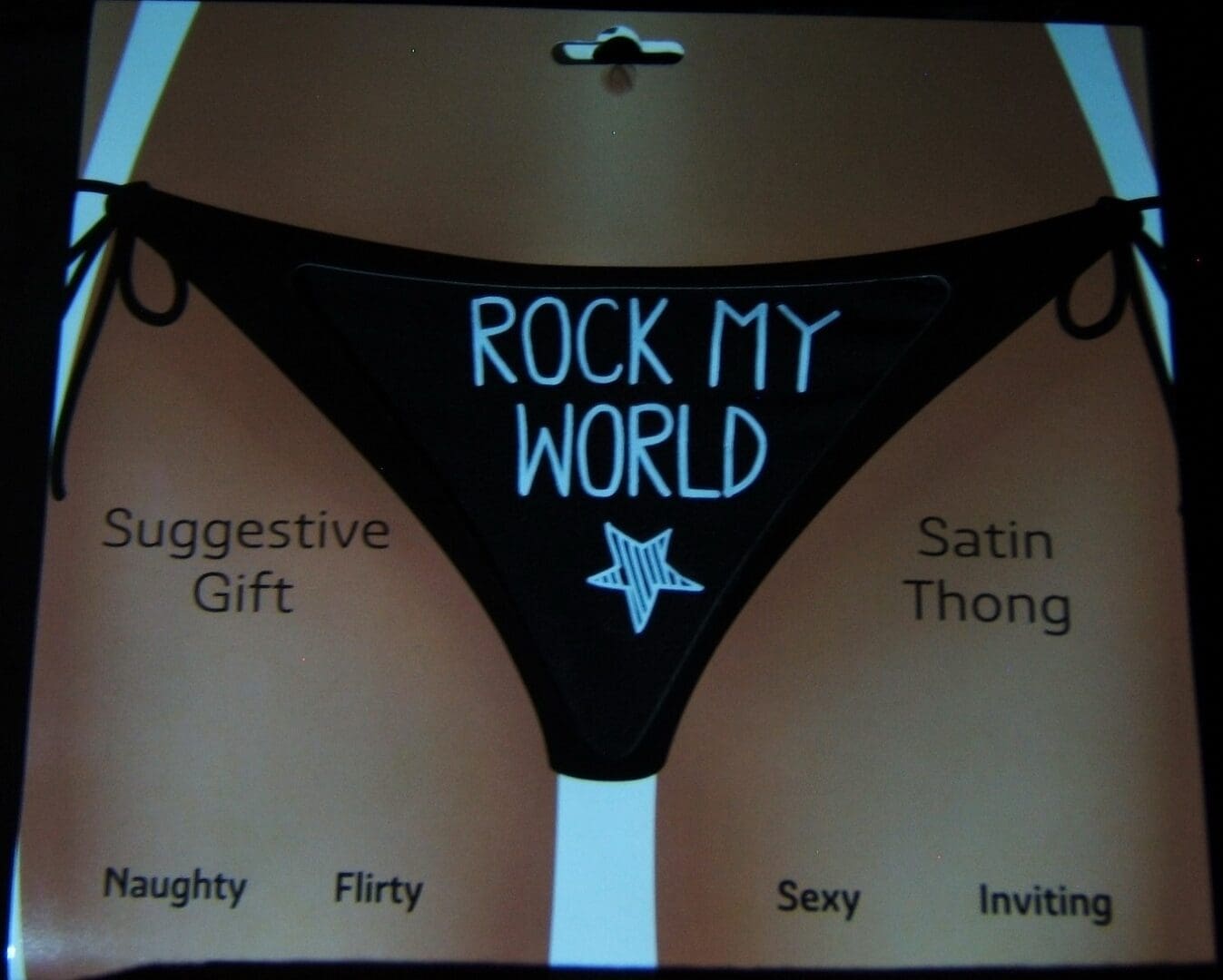 A black bikini with the words rock my world written on it.